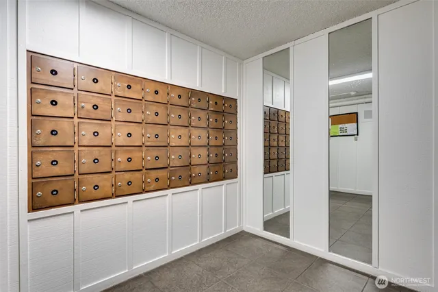 an aerial view of a house with a ocean view