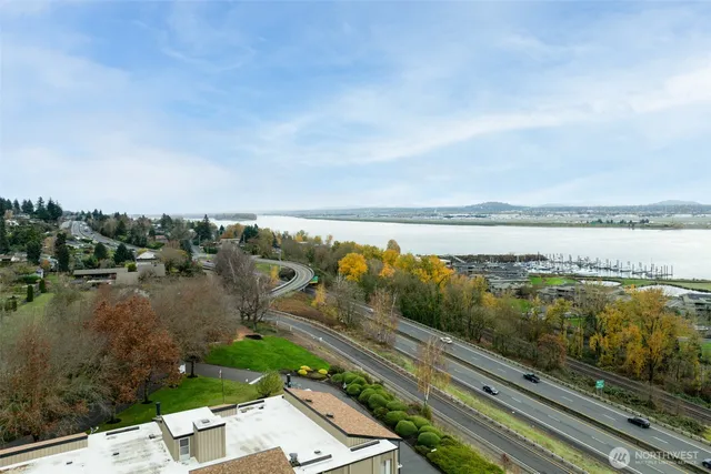 an aerial view of a house with a lake view