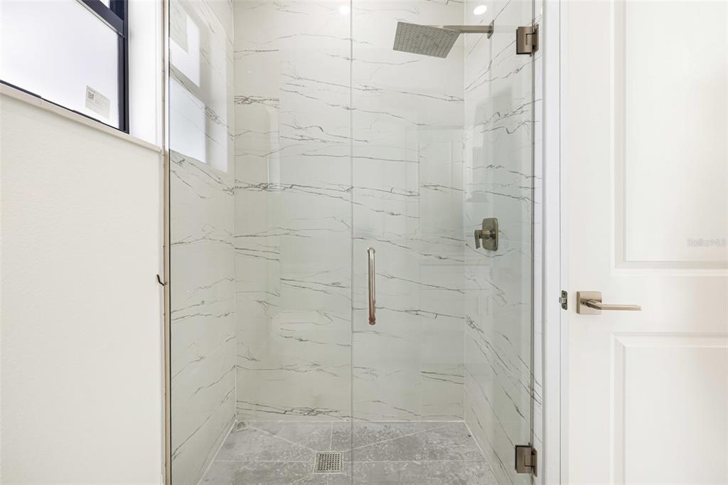 355 Milton Street Port Charlotte, FL 33954 - Photo 26 of 45 a bathroom with a shower