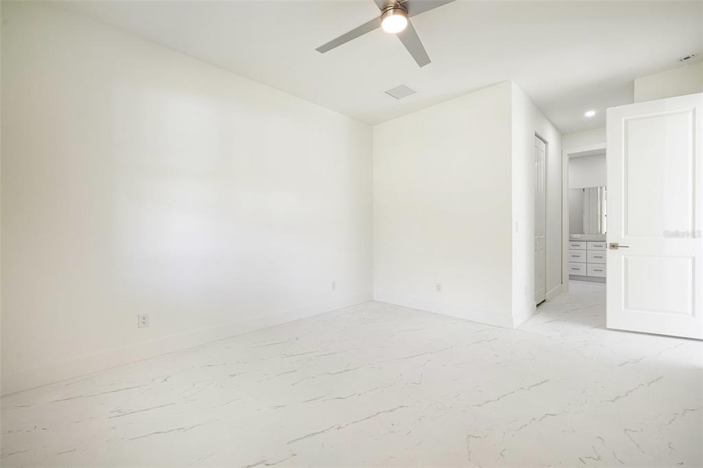 355 Milton Street Port Charlotte, FL 33954 - Photo 34 of 45 wooden floor in an empty room