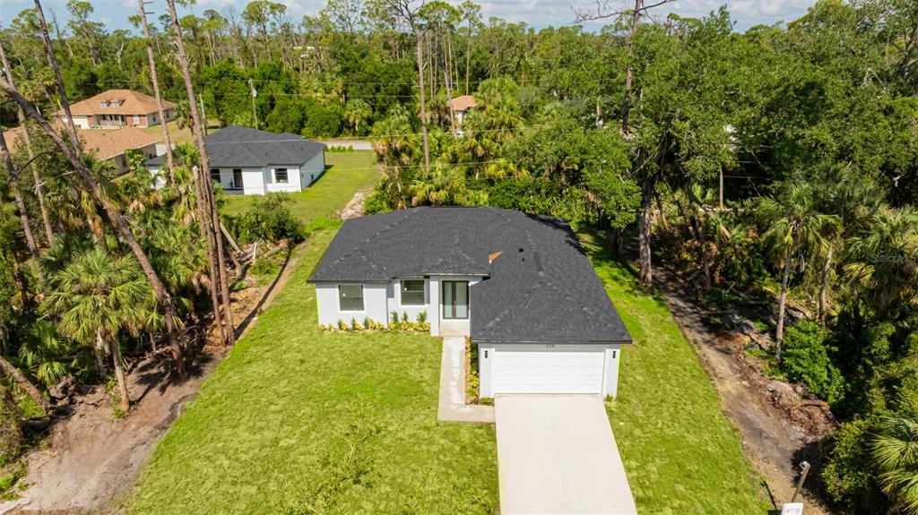 355 Milton Street Port Charlotte, FL 33954 - Photo 42 of 45 an aerial view of multiple houses