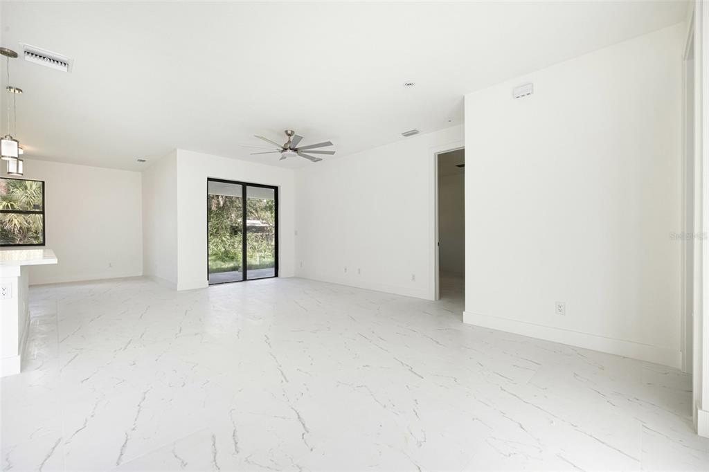 355 Milton Street Port Charlotte, FL 33954 - Photo 8 of 45 an empty room with windows