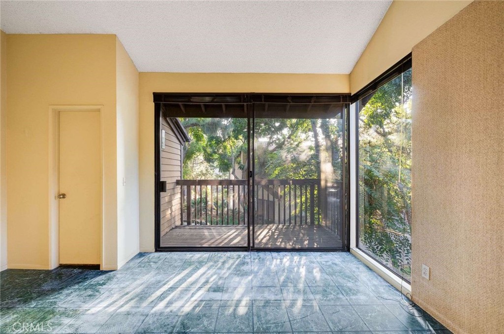 4140 Workman Mill Road, Unit 170 Whittier, CA 90601 - Photo 19 of 32 a view of a big room with wooden floor and doors