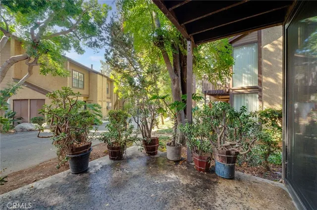a view of a porch with seating space
