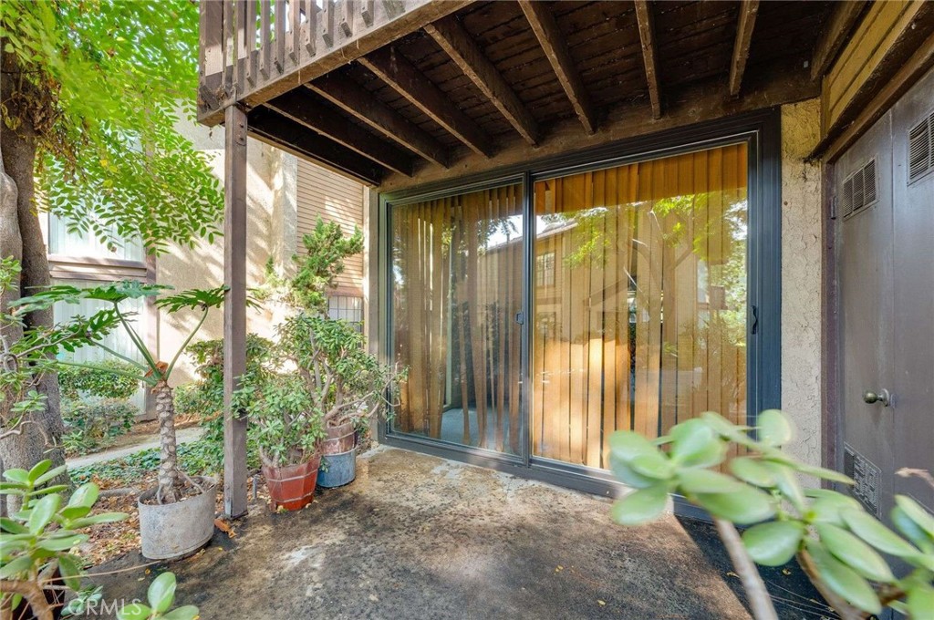 4140 Workman Mill Road, Unit 170 Whittier, CA 90601 - Photo 3 of 32 a garden filled with lots of potted plants