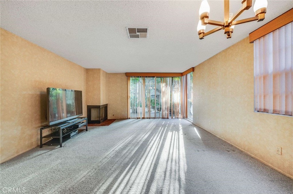 4140 Workman Mill Road, Unit 170 Whittier, CA 90601 - Photo 7 of 32 a view of a room with gym equipment
