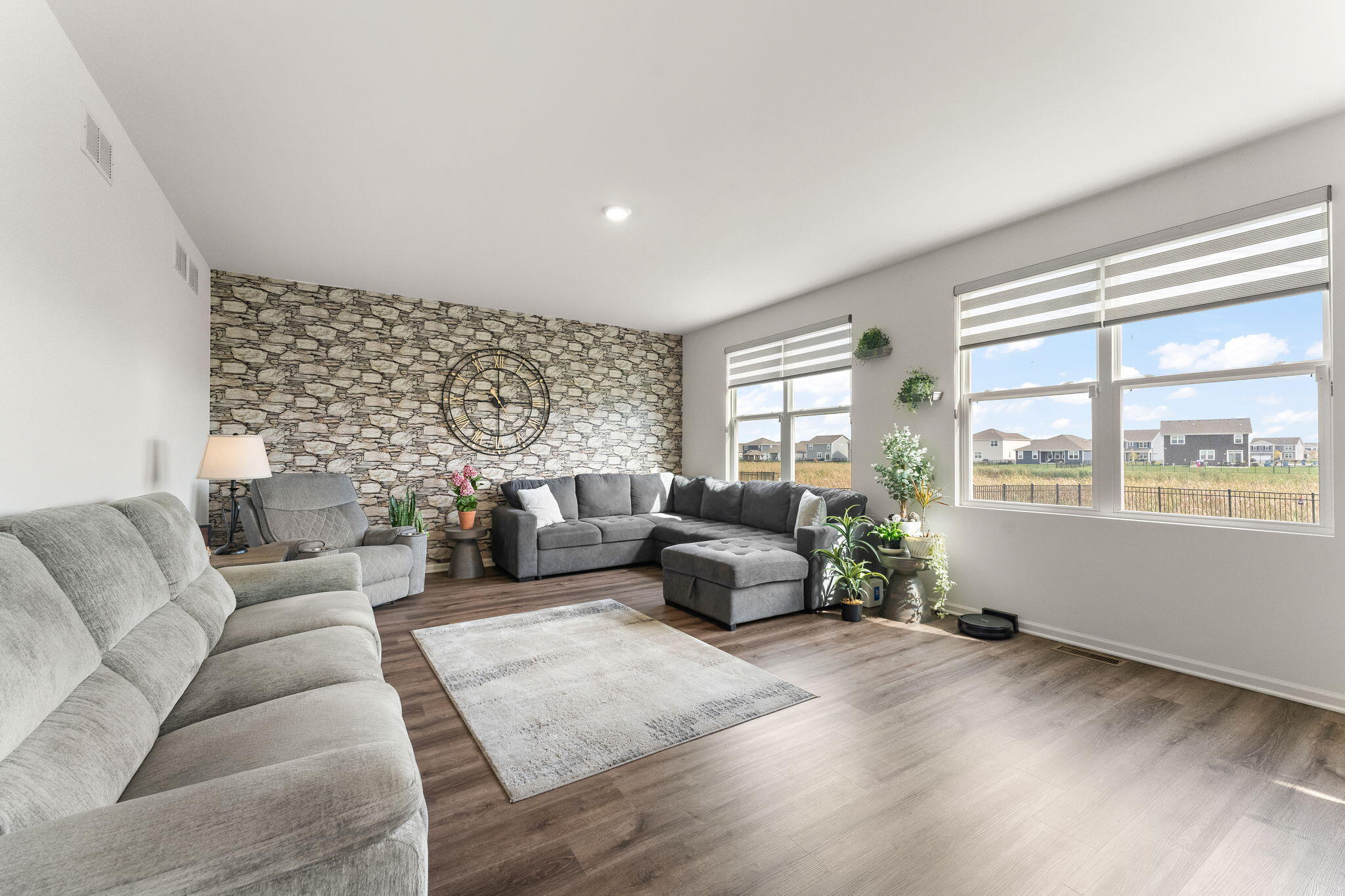 10453 Privet Drive Crown Point, IN 46307 - Photo 15 of 38 a living room with furniture and windows
