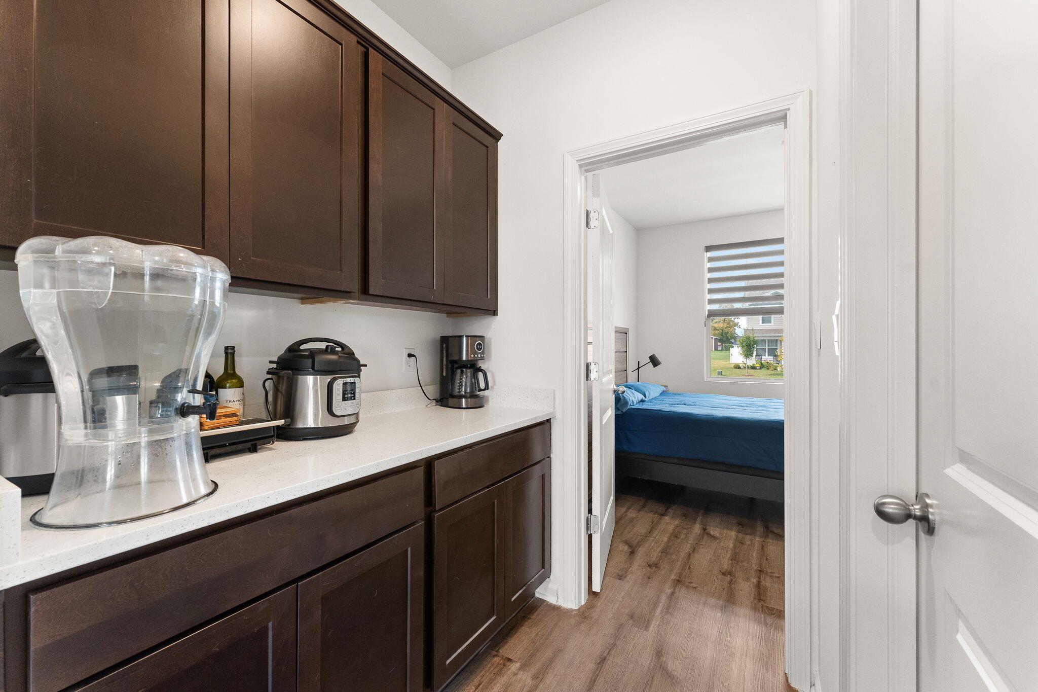 10453 Privet Drive Crown Point, IN 46307 - Photo 16 of 38 a kitchen with a sink and cabinets