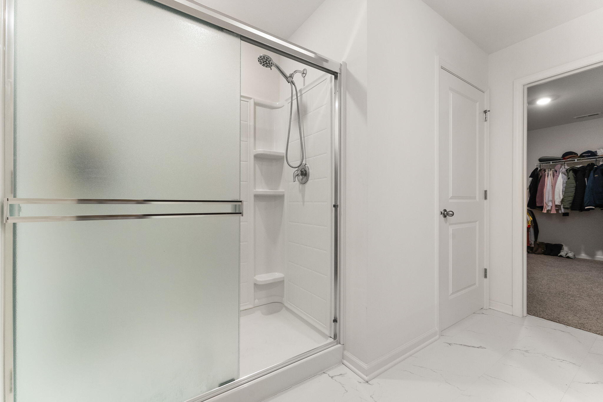 10453 Privet Drive Crown Point, IN 46307 - Photo 22 of 38 a bathroom with a shower and a toilet