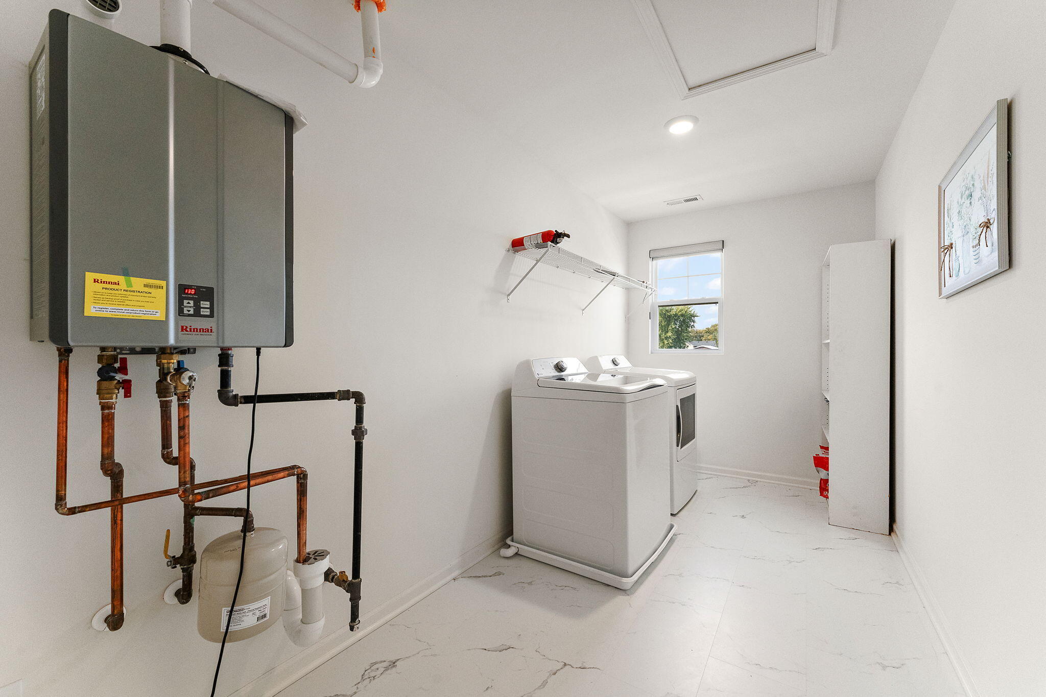 10453 Privet Drive Crown Point, IN 46307 - Photo 29 of 38 a utility room with a sink dryer and washer