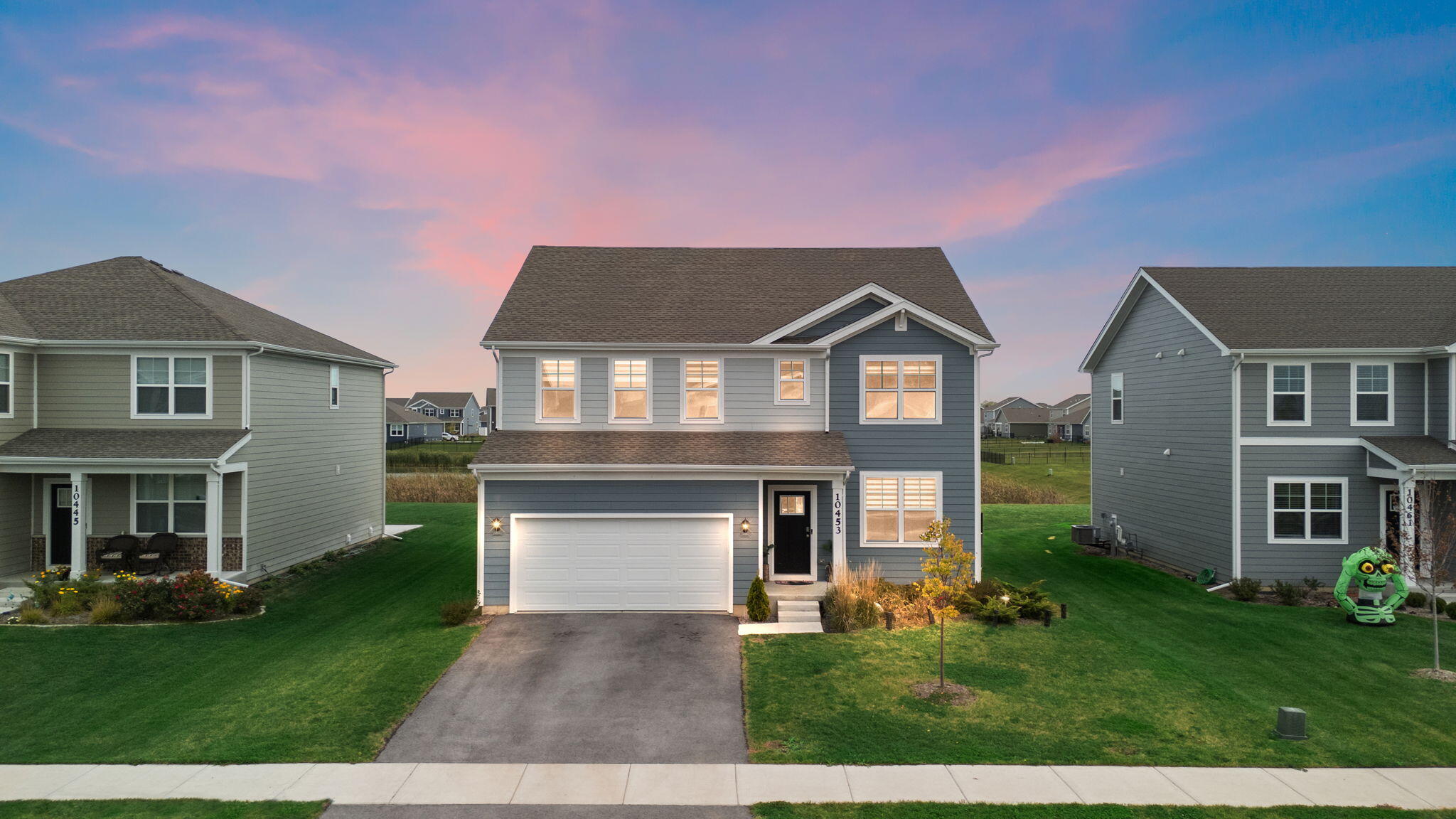 10453 Privet Drive Crown Point, IN 46307 - Photo 3 of 38 front view of a house with a yard