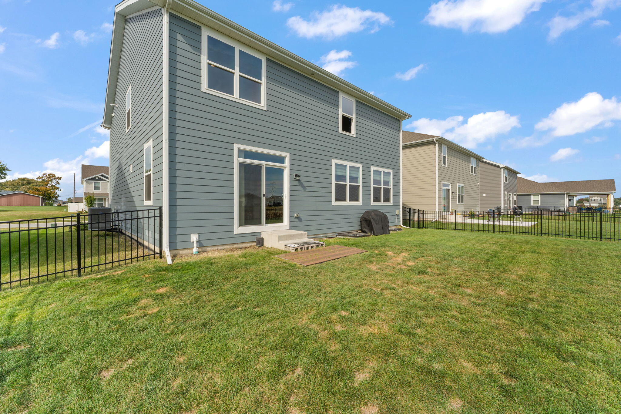 10453 Privet Drive Crown Point, IN 46307 - Photo 32 of 38 a view of a house with a yard