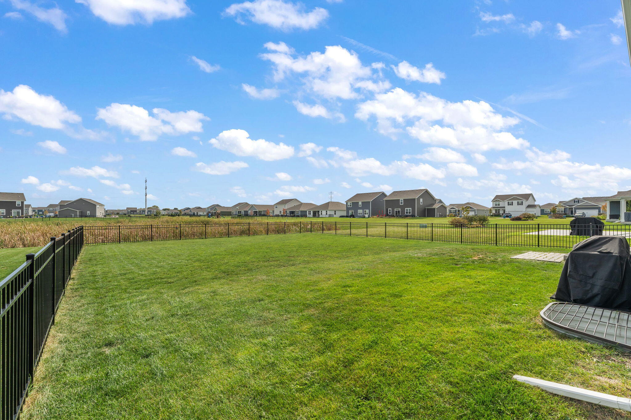 10453 Privet Drive Crown Point, IN 46307 - Photo 33 of 38 a view of a lake with a yard
