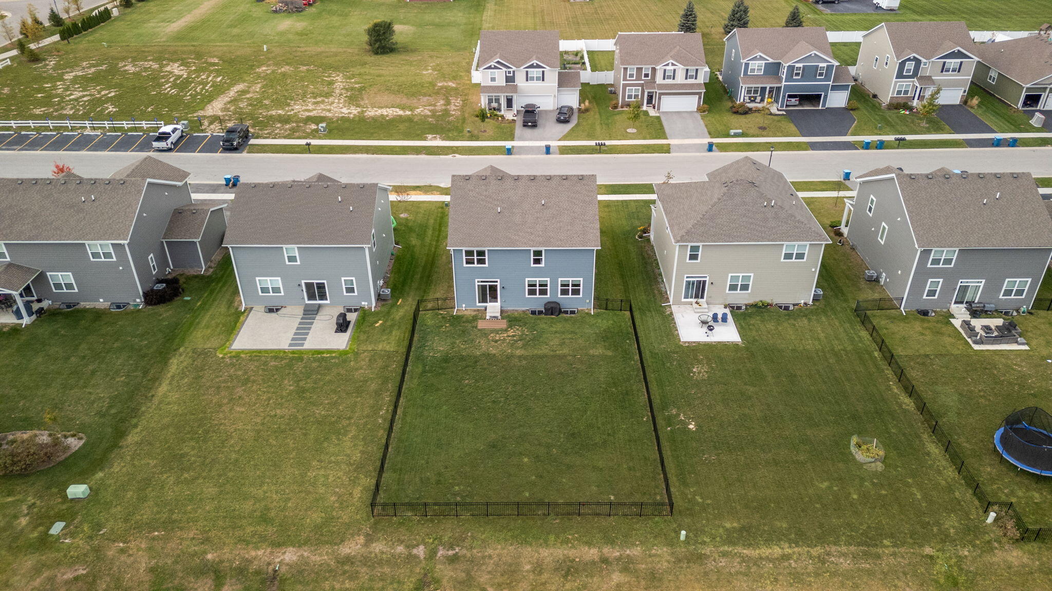 10453 Privet Drive Crown Point, IN 46307 - Photo 35 of 38 an aerial view of residential houses with outdoor space and swimming pool