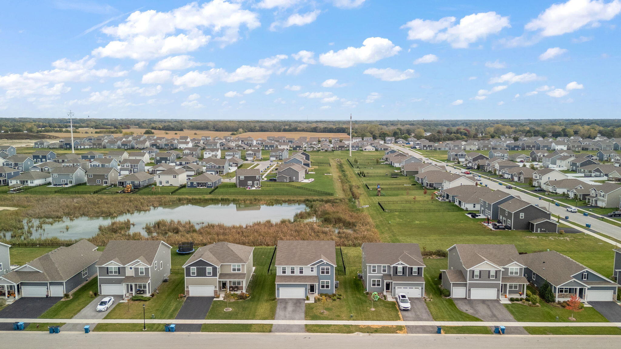 10453 Privet Drive Crown Point, IN 46307 - Photo 36 of 38 a view of lake with city view