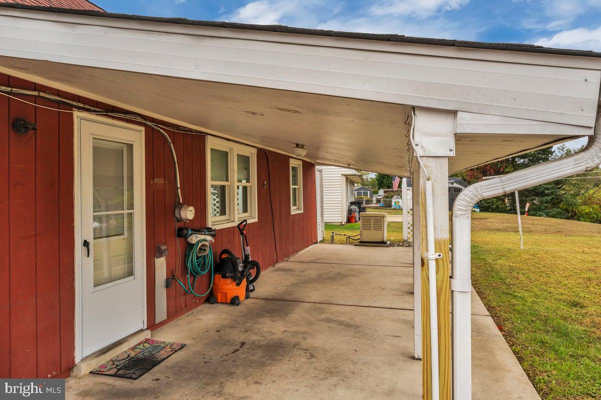 418 Westminster Road Wenonah, NJ 08090 - Photo 25 of 28 a view of a porch with a table and chairs