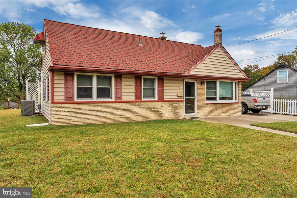 418 Westminster Road Wenonah, NJ 08090 - Photo 3 of 28 a front view of a house with a garden