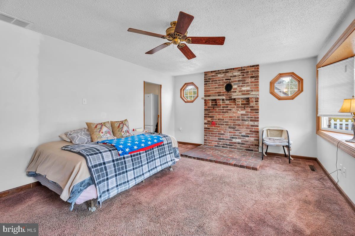 418 Westminster Road Wenonah, NJ 08090 - Photo 5 of 28 a living room with a couch and a table