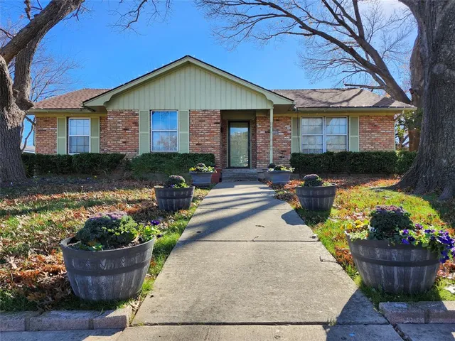 a front view of a house with patio