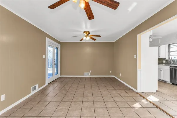 a view of an empty room and window