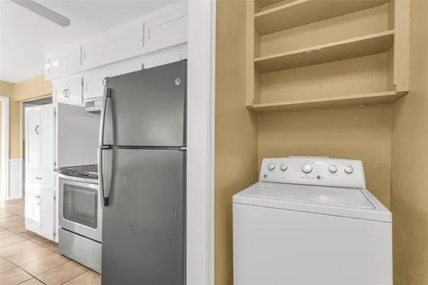 a view of storage and utility room with washer and dryer