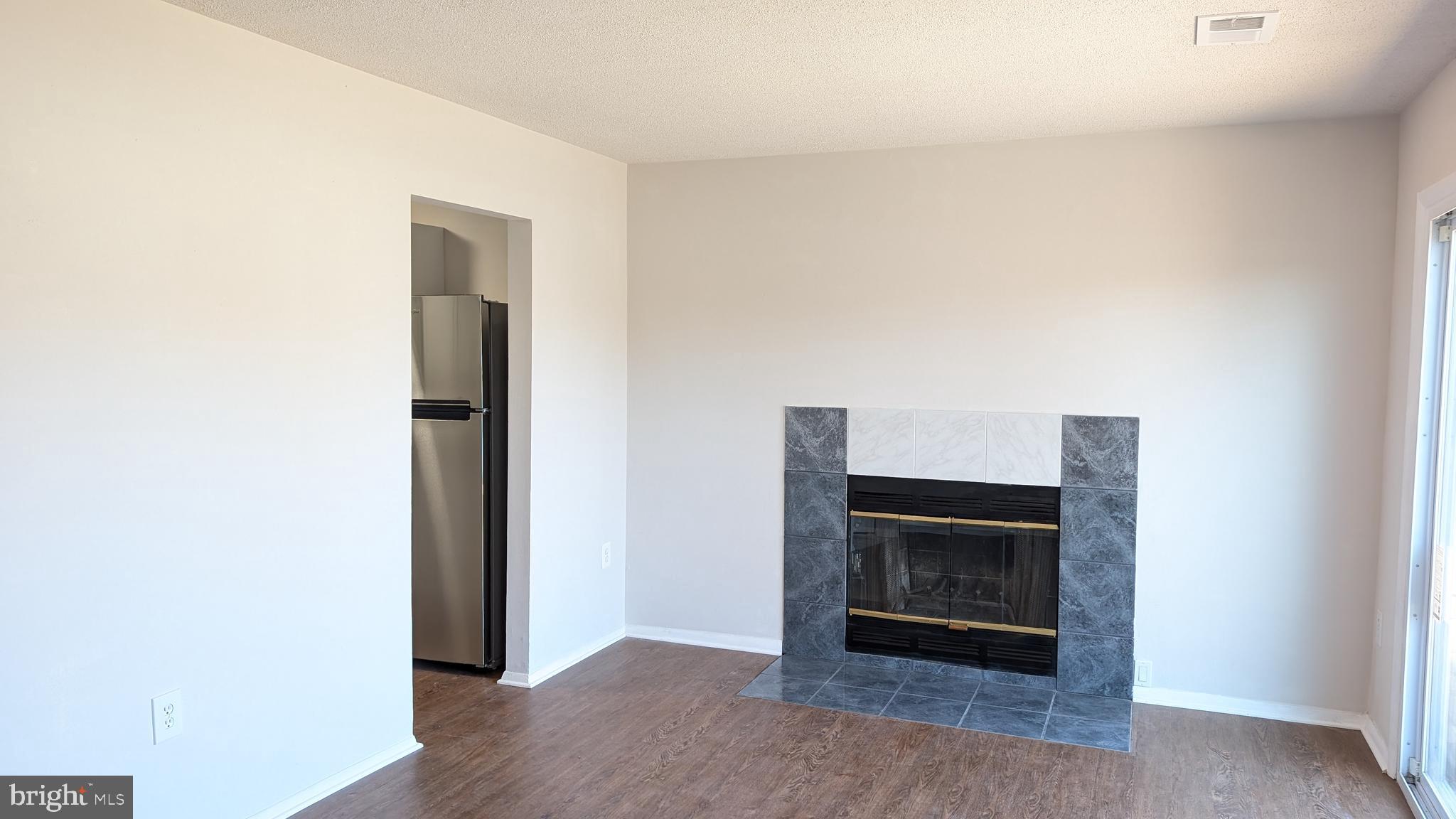 43 Vienna Court Frederick, MD 21702 - Photo 13 of 38 a view of an empty room with fire place