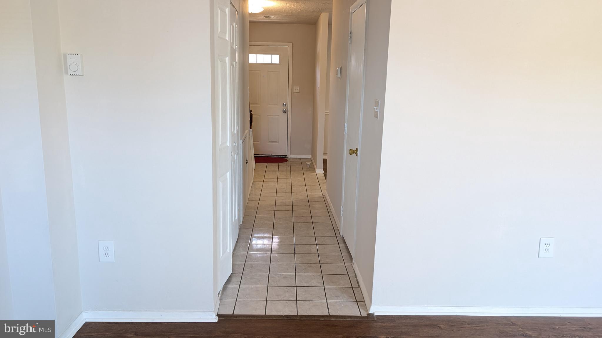 43 Vienna Court Frederick, MD 21702 - Photo 14 of 38 a view of a room with wooden floor