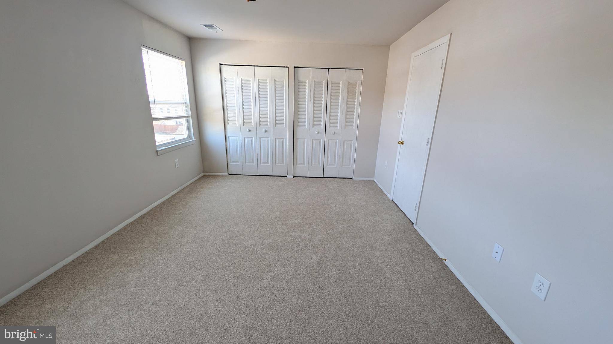 43 Vienna Court Frederick, MD 21702 - Photo 19 of 38 an empty room with windows