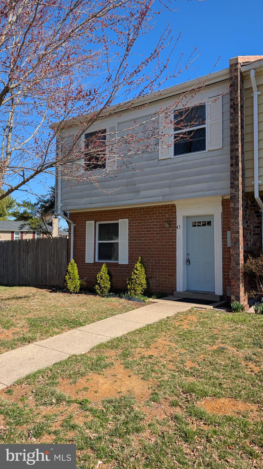 43 Vienna Court Frederick, MD 21702 - Photo 2 of 38 a front view of a house with a yard