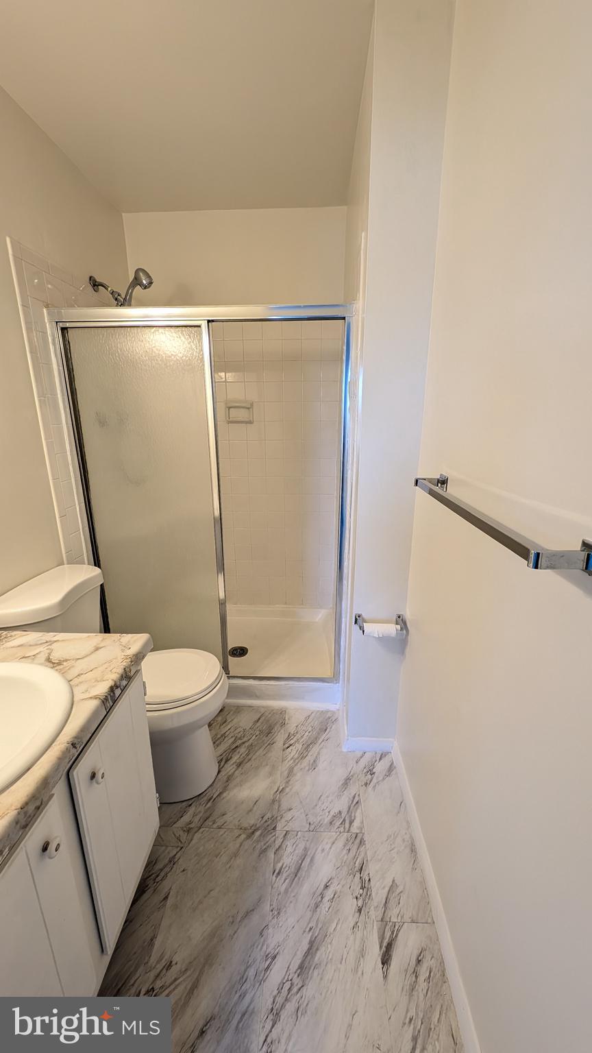 43 Vienna Court Frederick, MD 21702 - Photo 21 of 38 a bathroom with a toilet and a shower