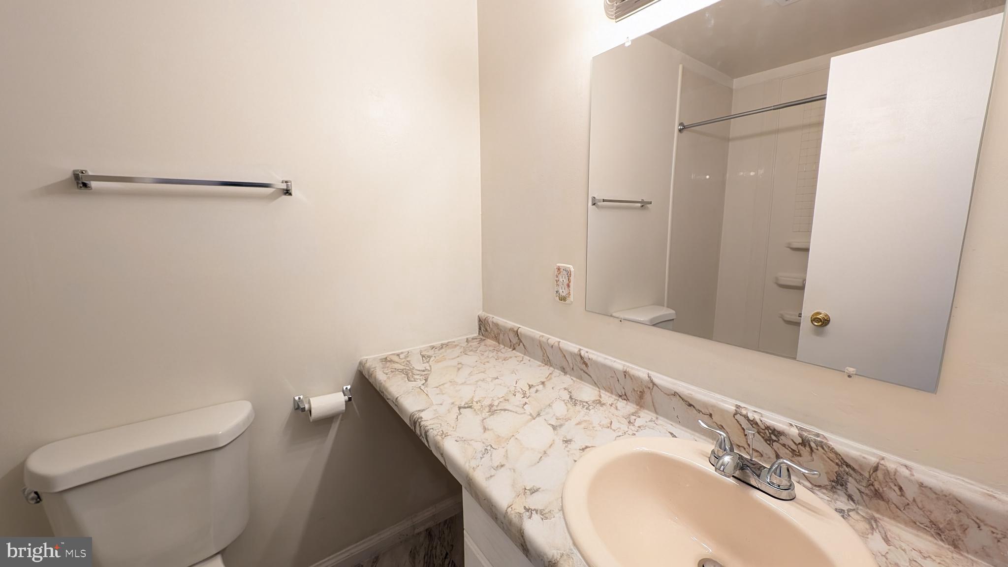 43 Vienna Court Frederick, MD 21702 - Photo 26 of 38 a bathroom with a sink and a toilet