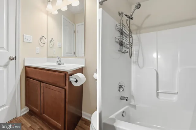 a bathroom with a sink a toilet and a bathtub