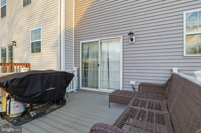 a house view with a backyard space