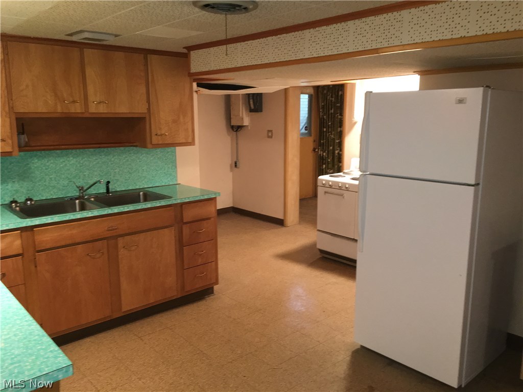 7457 Warren - Sharon Road Brookfield, OH 44403 - Photo 19 of 24 Second kitchen in the basement.