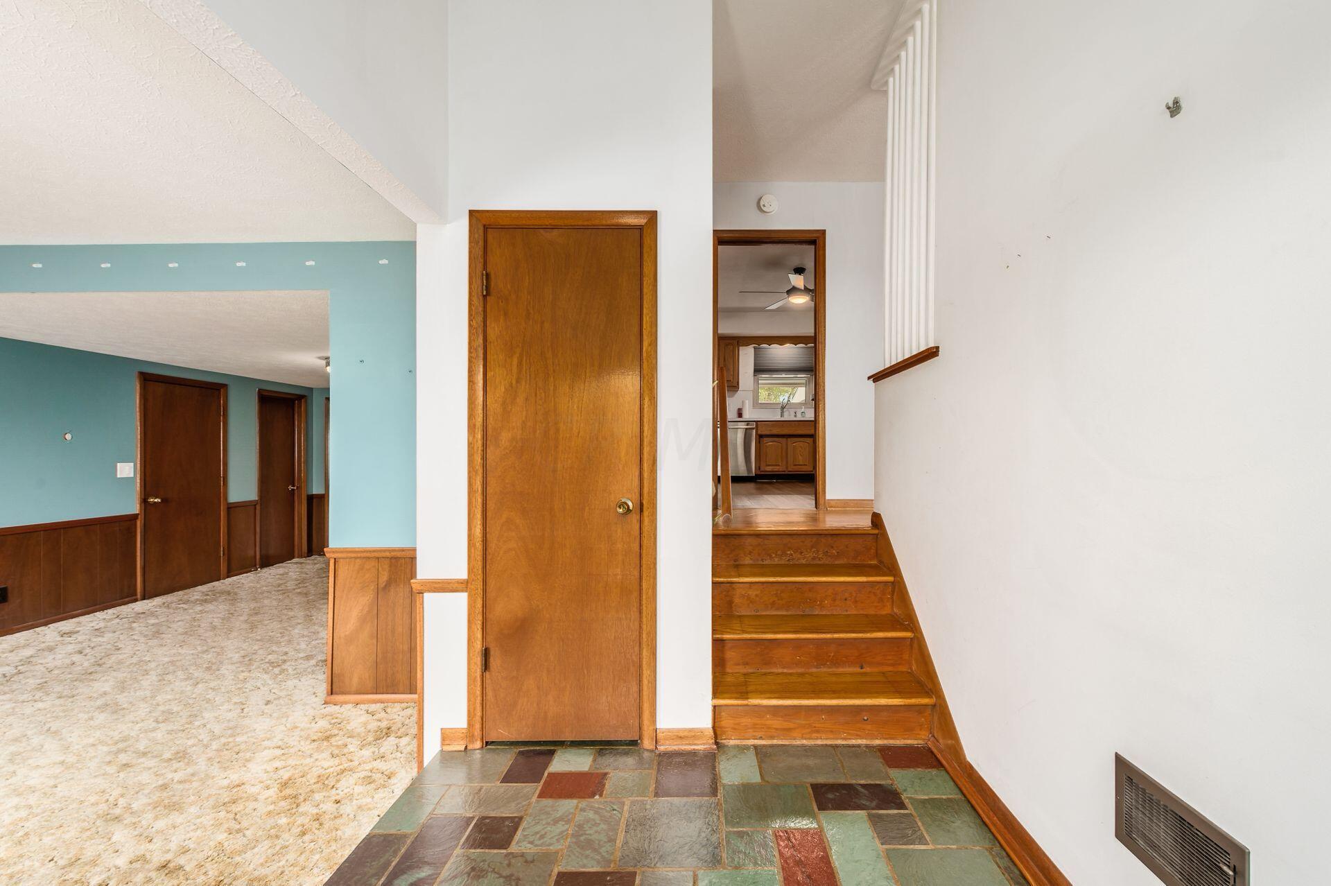 5355 Karl Road Columbus, OH 43229 - Photo 5 of 39 ENTRY WITH SLATE FLOOR; STEPS TO LIVING RM, DINING RM AND KITCHEN