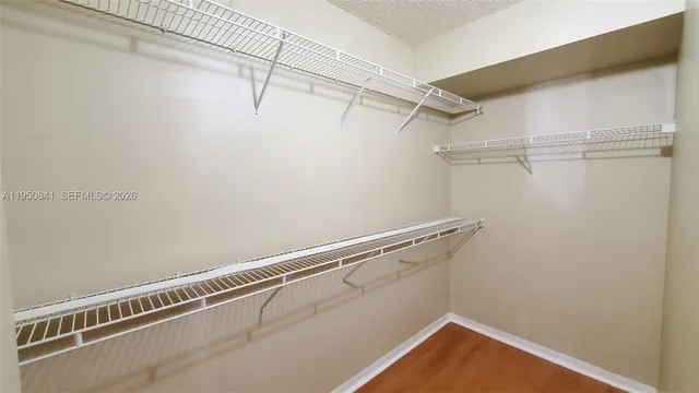 a view of a room with racks on the wall