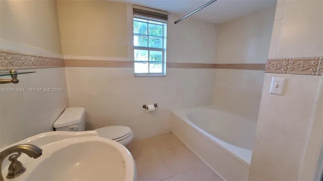 a bathroom with a sink and a bathtub