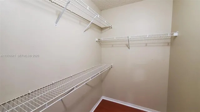 a view of a room with racks on the wall