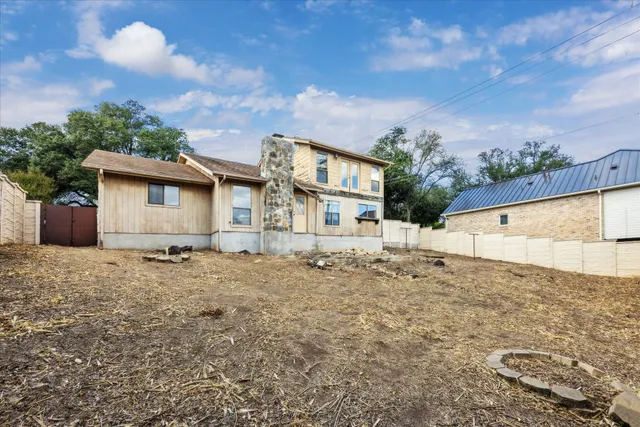 a backyard of a house with lots of green space