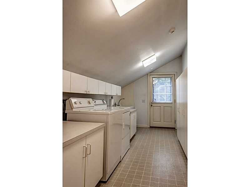 23 Belmont Road Warwick, RI 02818 - Photo 14 of 25 Laundry Room. LAUNDRY WITH SINK, CLOSETS AND DOOR TO SIDE YARD. BRING THE DOGS IN THIS WAY!