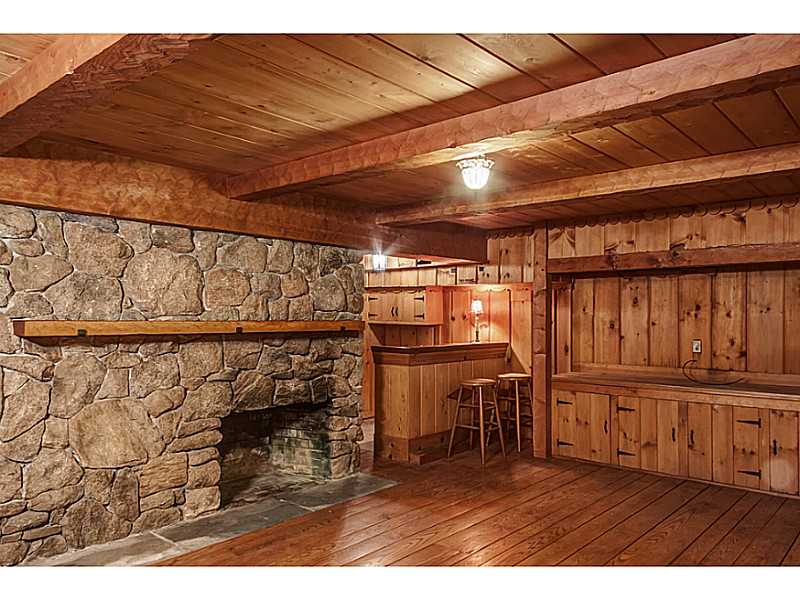 23 Belmont Road Warwick, RI 02818 - Photo 20 of 25 Cellar or Basement. VINTAGE REC ROOM WITH STONE FIREPLACE & WET BAR