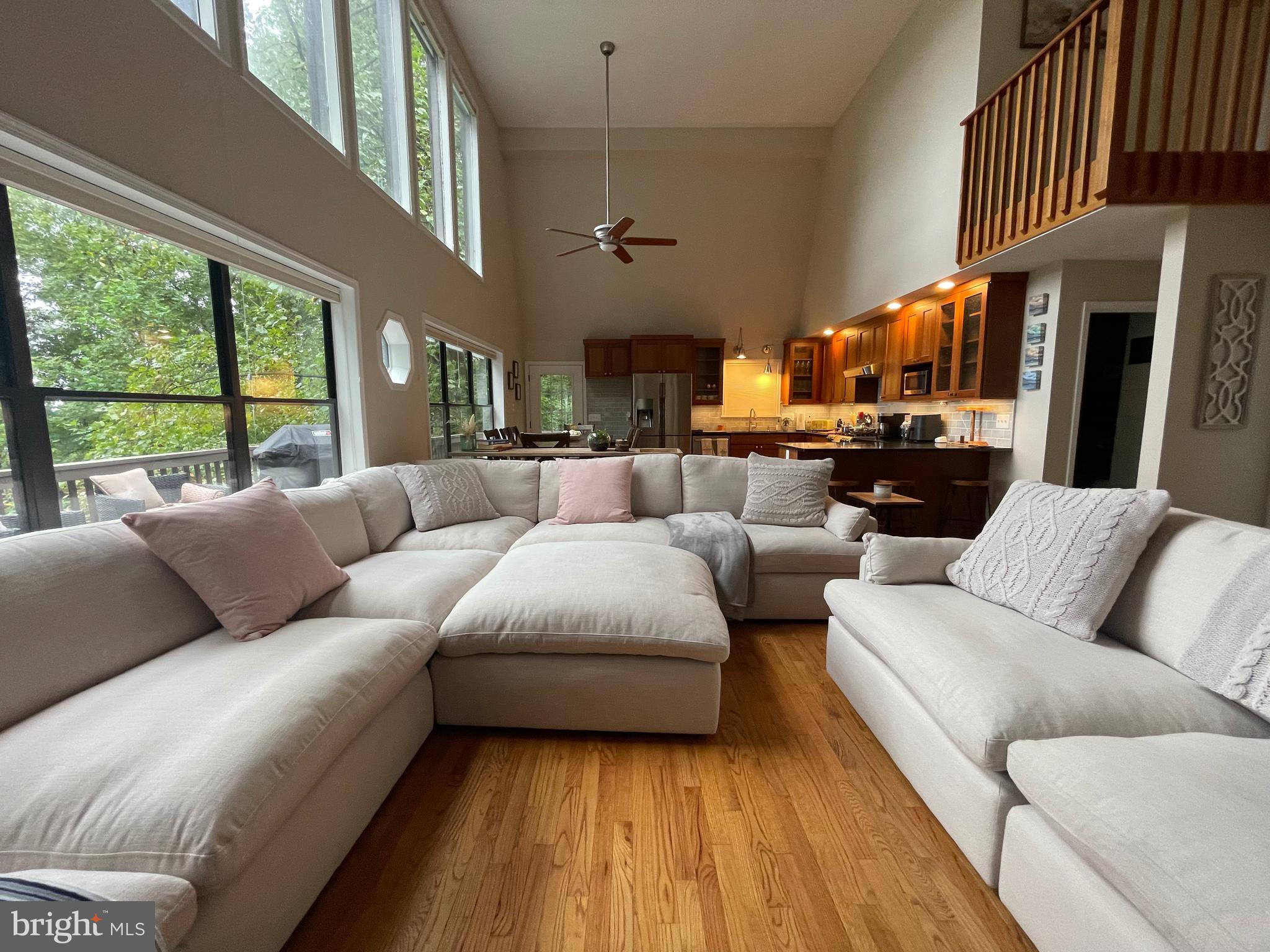 2315 Lookout Road Haymarket, VA 20169 - Photo 3 of 43 a living room with furniture a fireplace and a large window