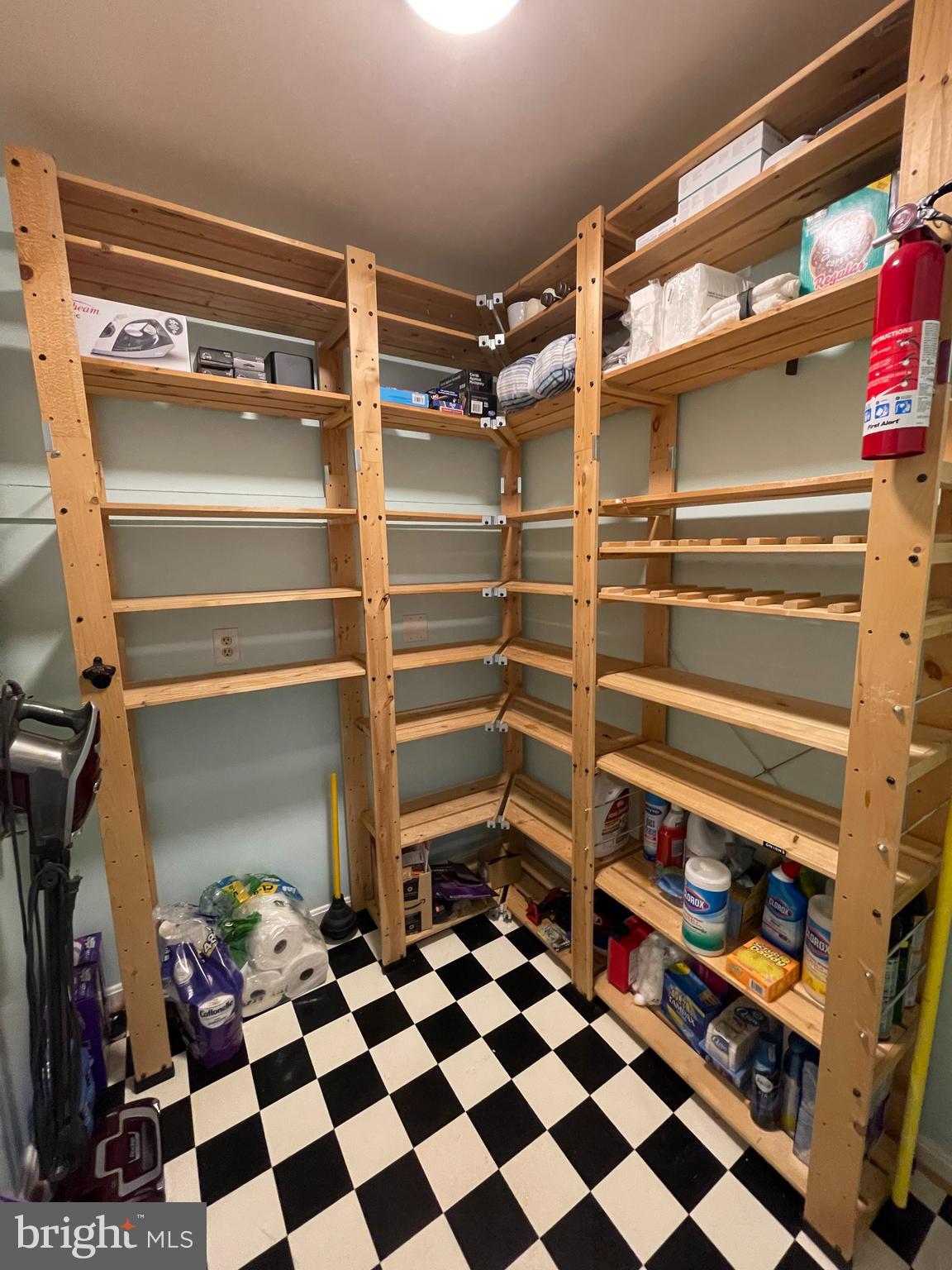 2315 Lookout Road Haymarket, VA 20169 - Photo 31 of 43 a room with a black white checkered floor