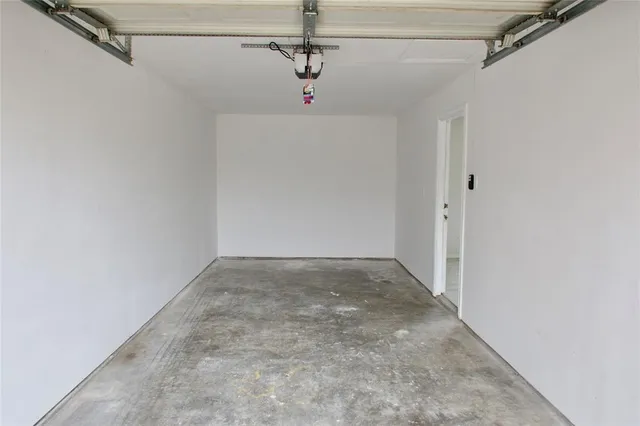 a view of a hallway with a shower