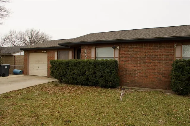 a brick house with a outdoor space