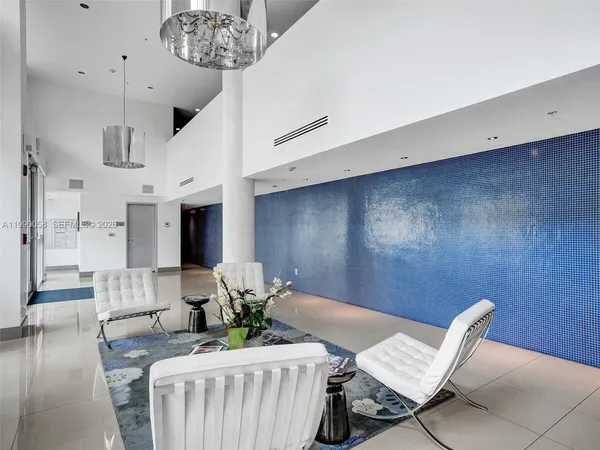 a view of a swimming pool with an ocean view