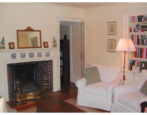 43 South Russell Boston, MA 02114 - Photo 7 of 8 a living room with furniture and a fireplace