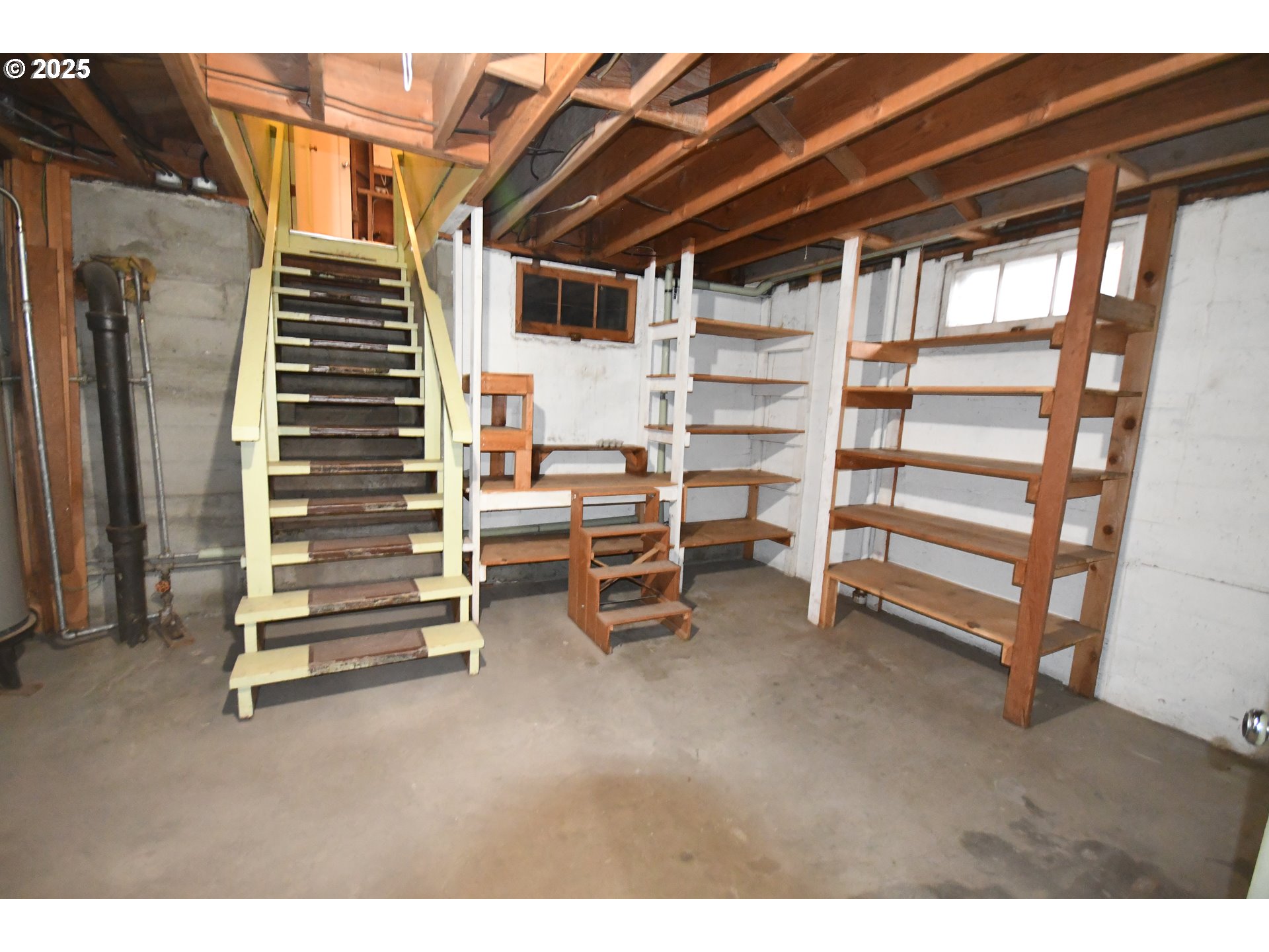 1300 View Court The Dalles, OR 97058 - Photo 24 of 45 a view of an empty room with stairs and furniture