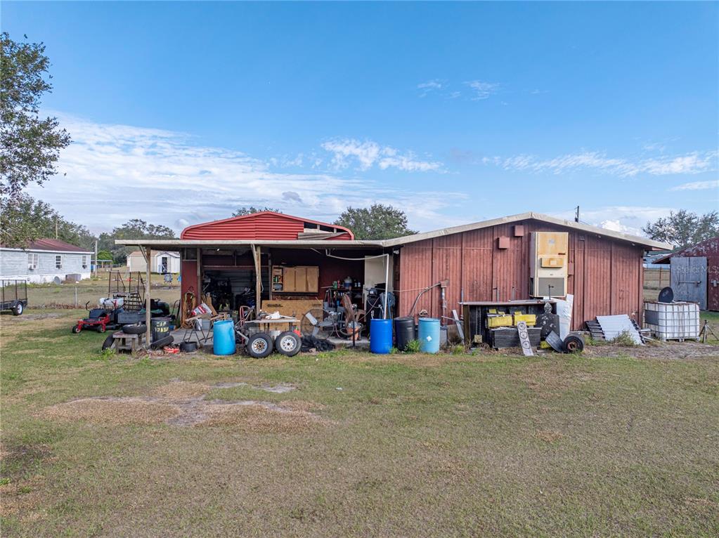 11404 Lithia Pinecrest Road Lithia, FL 33547 - Photo 52 of 63 a view of a car park in front of house