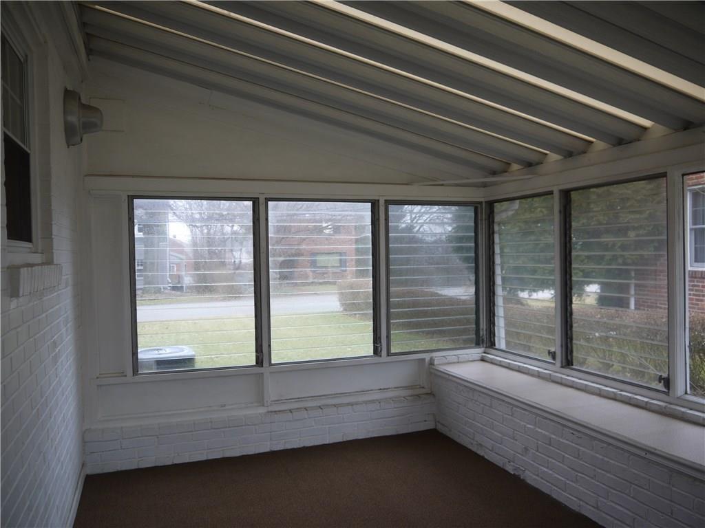 568 Highview Road Pittsburgh, PA 15234 - Photo 12 of 25 WALLS OF WINDOWS IN THE SUN ROOM MAKES ENTERTAINING A DELIGHT